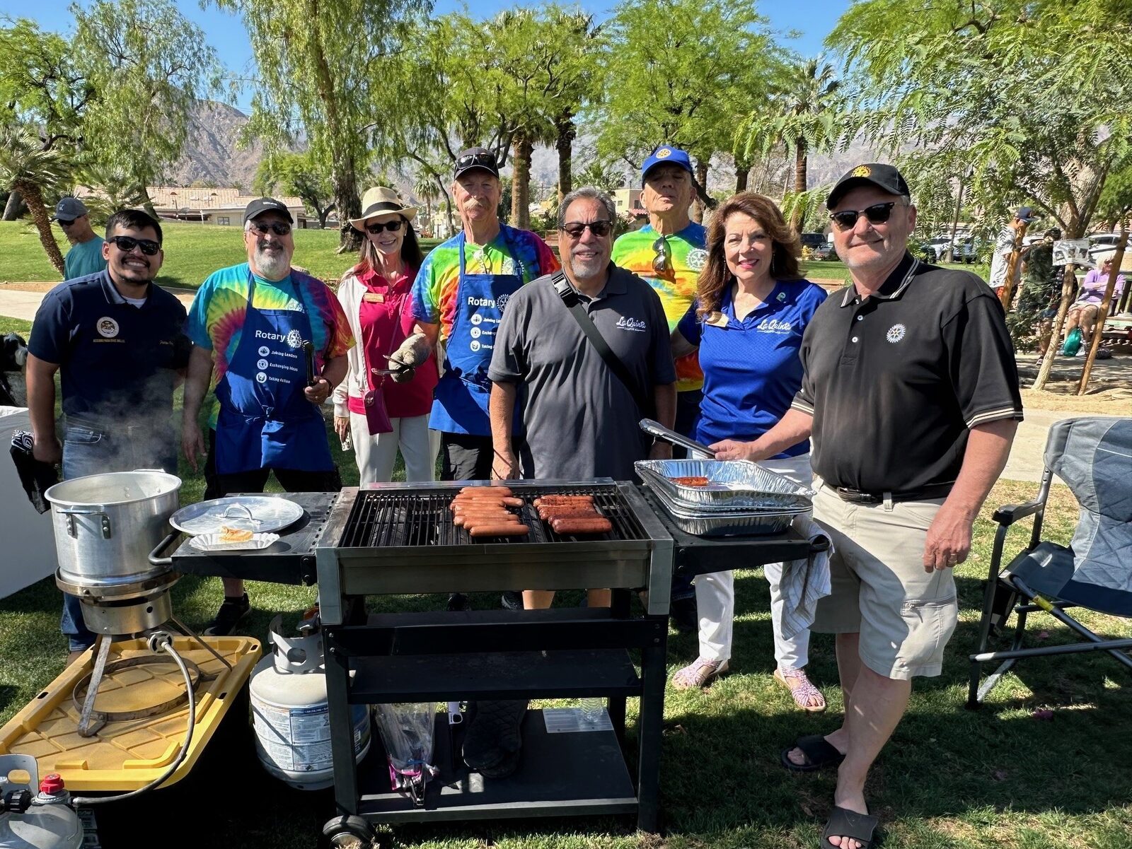 Rotarians serving together