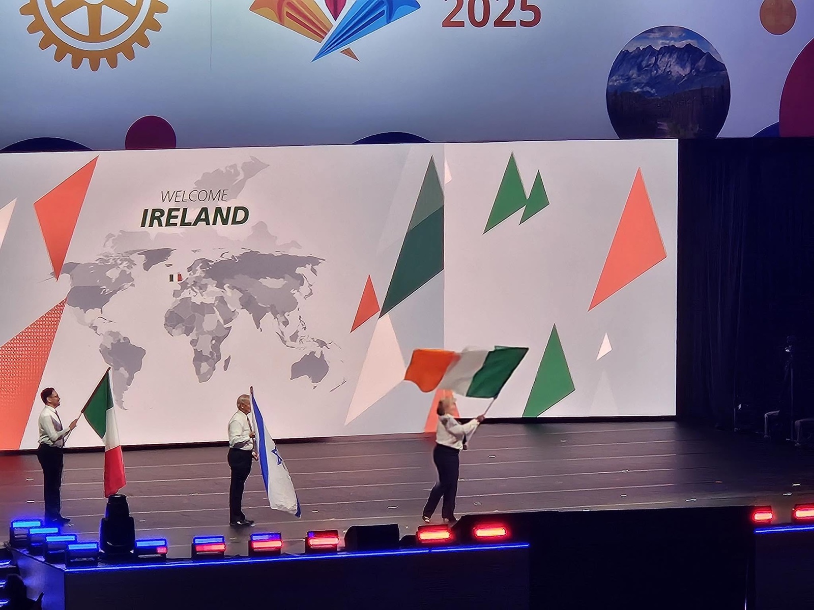 Flag bearers present the flag of Ireland during the Convention's Flag Ceremony