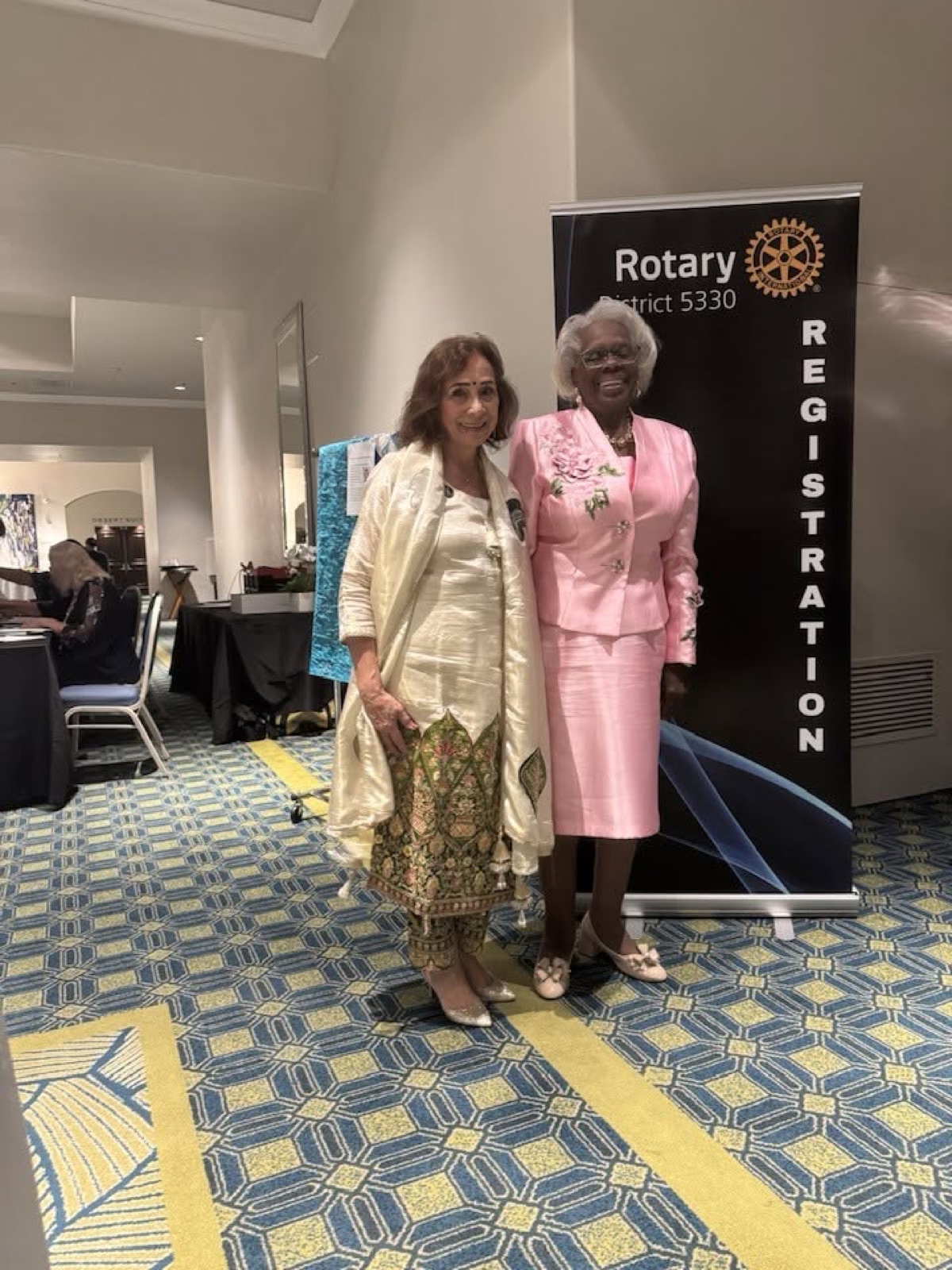 Rotarians at the registration banner, 2025 Foundation Gala