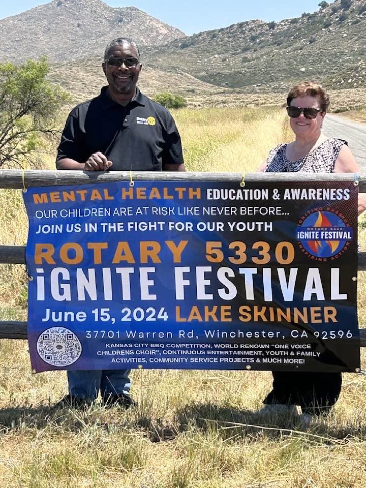 Rotary District 5330 leaders hold the iGNITE Festival banner at Lake Skinner, June 15, 2024