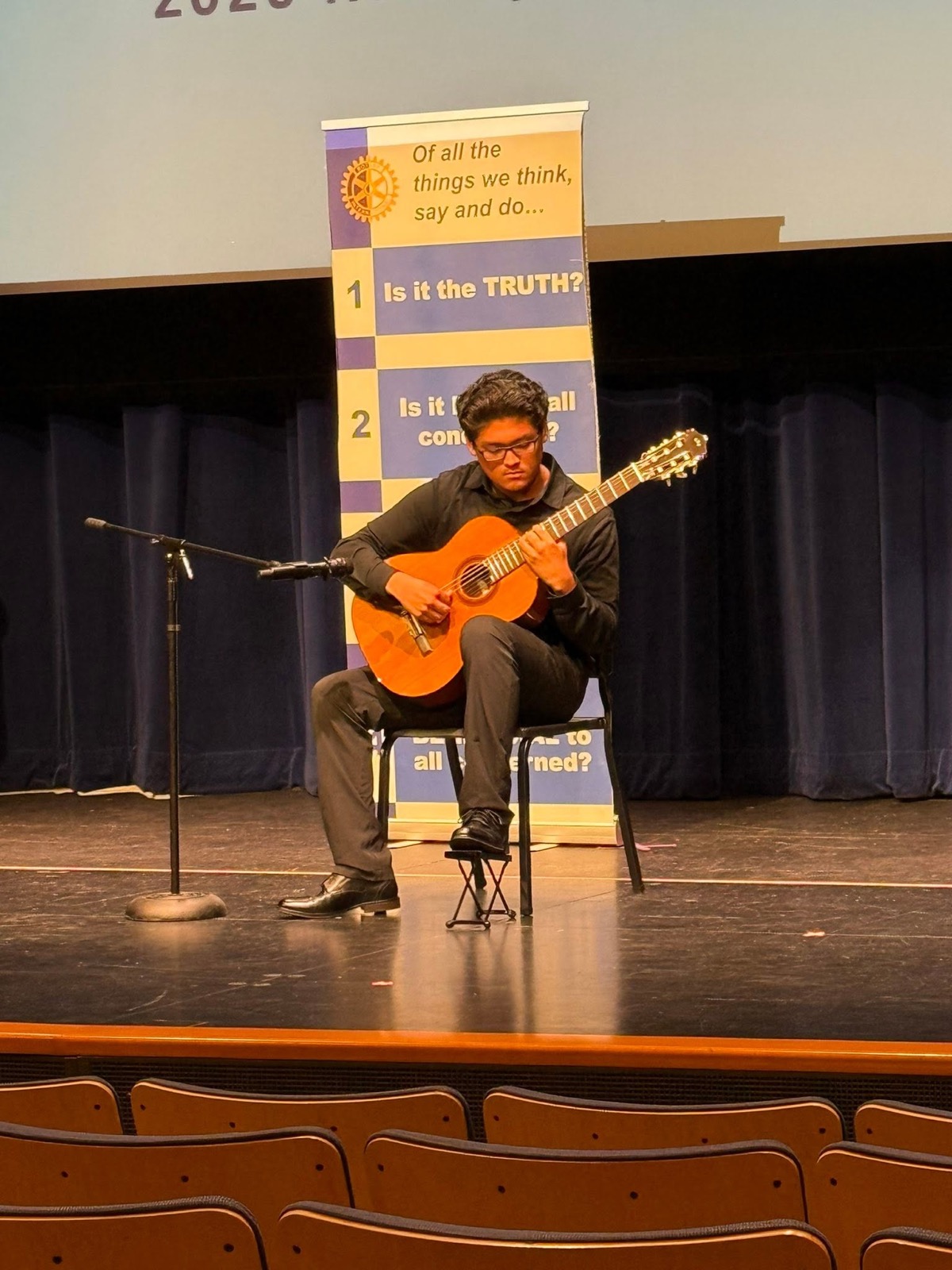 A young musician performing at a District 5330 event