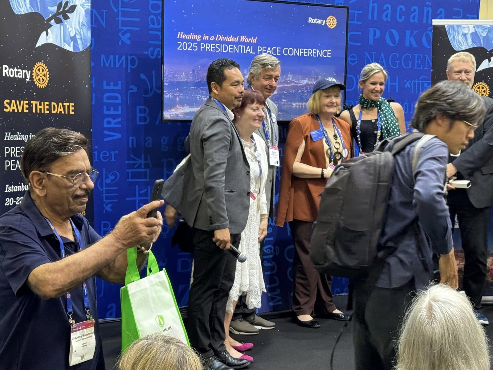 District 5330 members visit the 2025 Presidential Peace Conference booth in Singapore