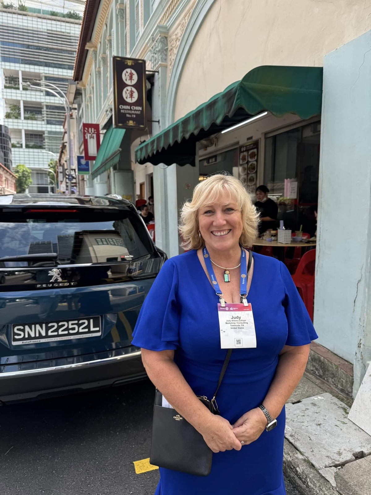 Judy Zulfiqar explores a Singapore street during the convention