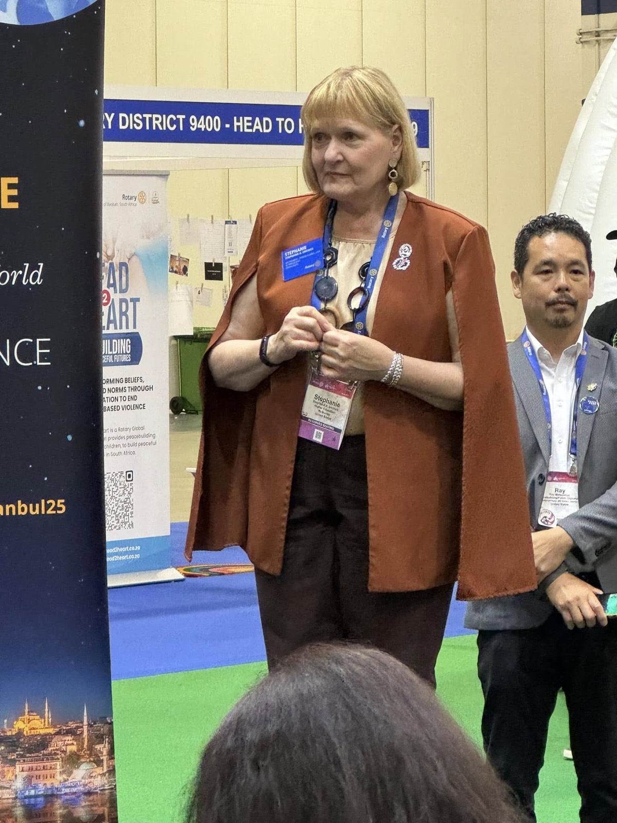 A District 5330 member visits a peacebuilding exhibit at the convention