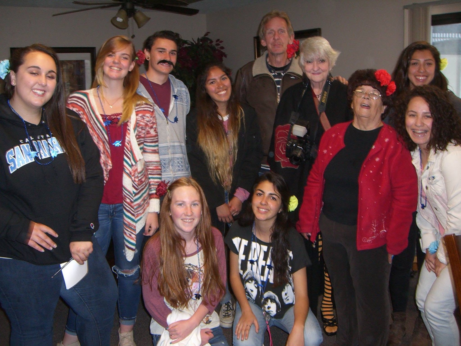 High-school students and seniors gathered together at a Rotary Friends project
